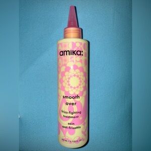 Amika Smooth Over Frizz-Fighting Treatment in Pink and Cream